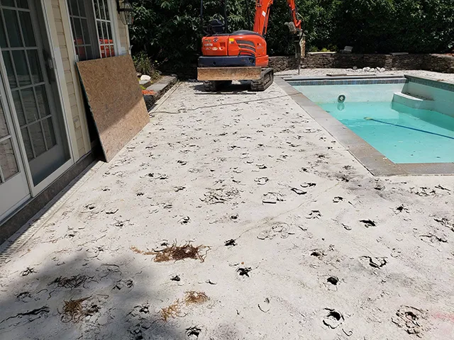 Prepping for Demolition - Preparing the pool deck area for demolition. - Remove A Pool DFW