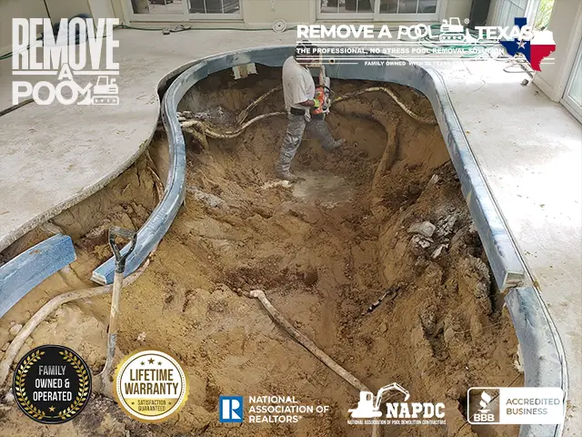 Breaking Up Pool Material - Breaking up the pool material, such as concrete or fiberglass, to facilitate removal.