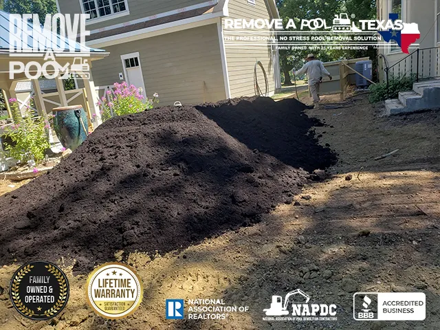 Spreading Topsoil - Spreading topsoil over the filled area. - Remove A Pool Dallas Fort-Worth Texas - Remove A Pool DFW