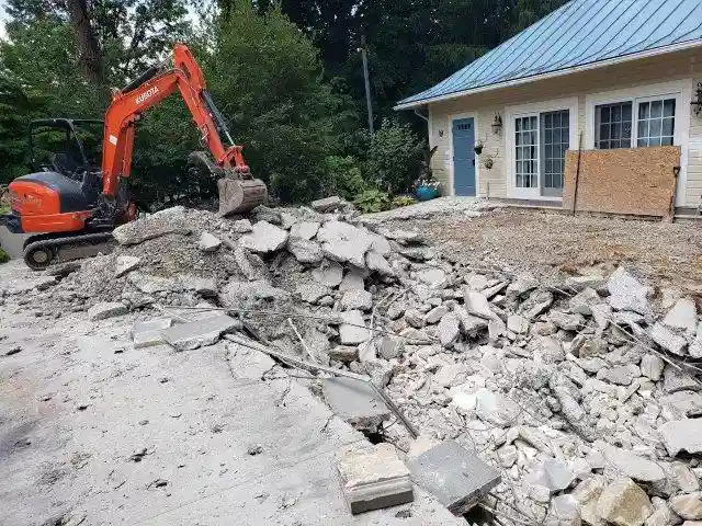 Clearing the pool cavity after demolition - Remove A Pool DFW